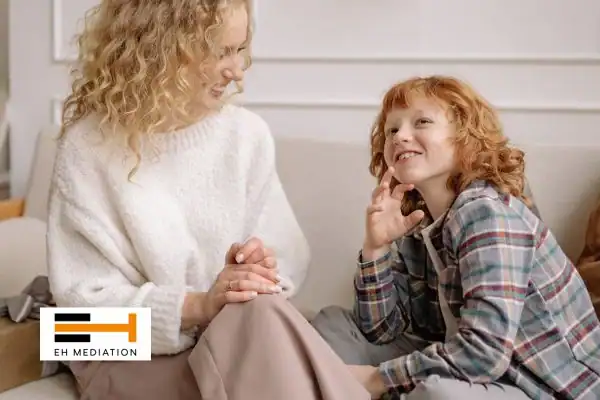 Happy mother and child after sorting child arrangements mediation Deal